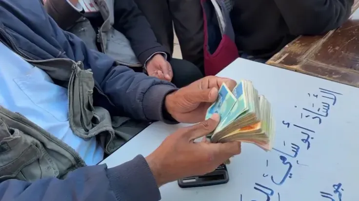 أزمة السيولة النقدية في غزة: بين هبوط النقد التالف وسد الفجوة الرقمية